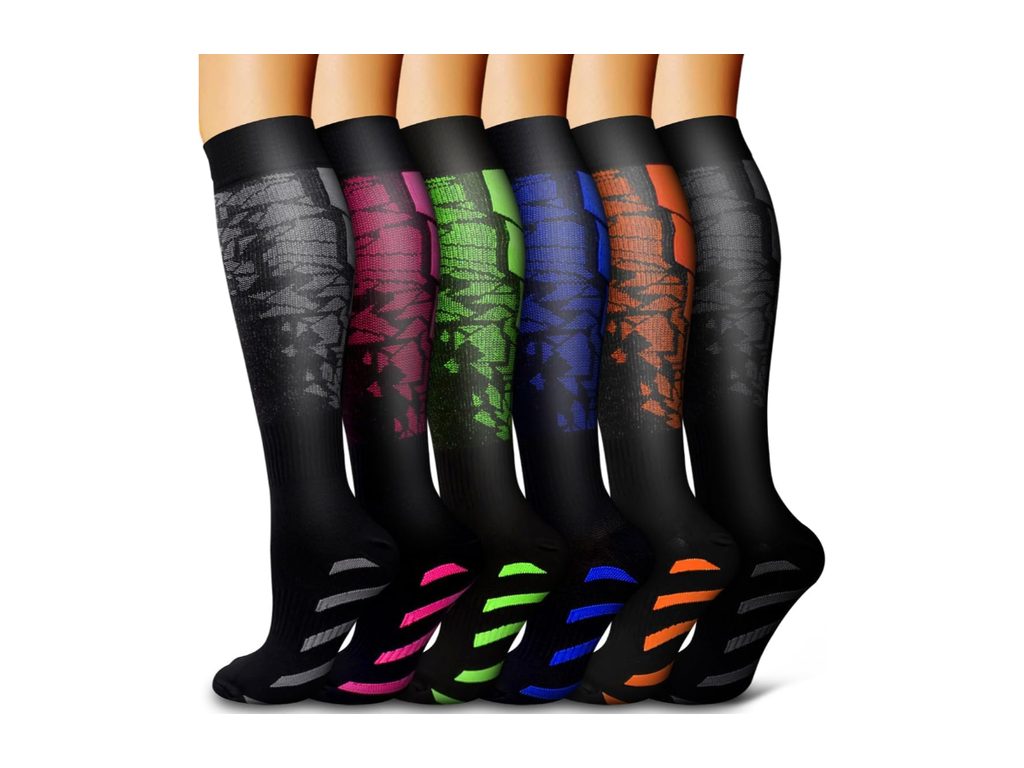 Six knee-high black socks, each with a different colour accent on the calf panel and heel